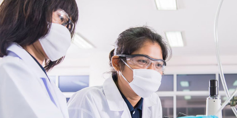 Two people working in lab