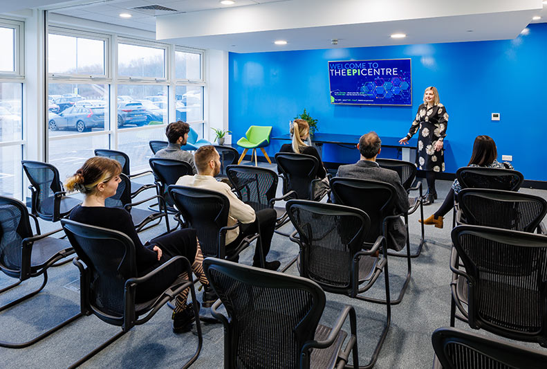 People sat at a presentation